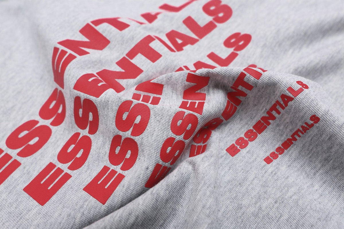 ESSENTIALS Repeated Graphic Short-Sleeve T-Shirt